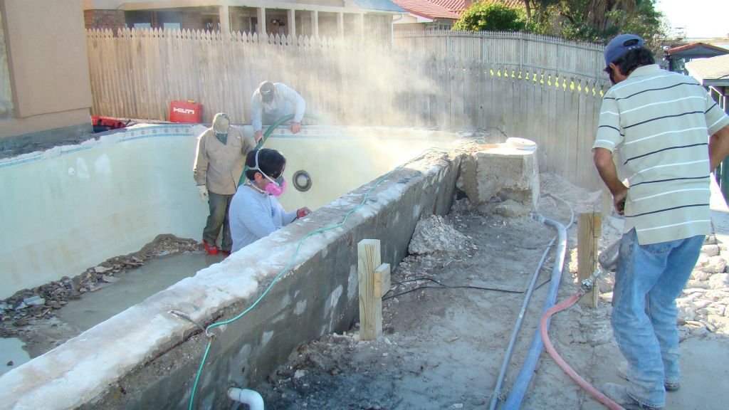 DEMO TILE, KOOL DECK, GUNITE at EXISTING POOL